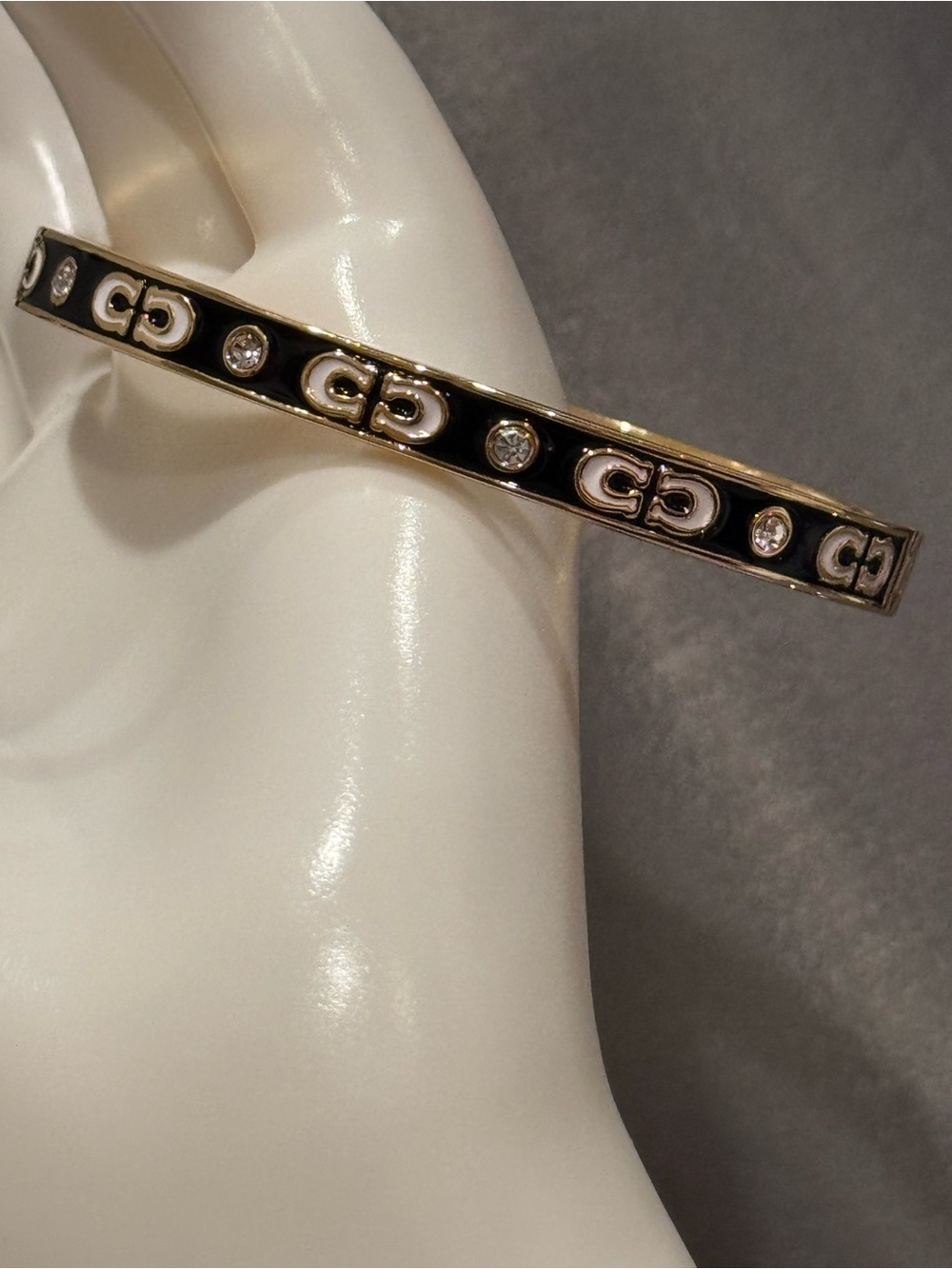 Coach Kissing C Enamel Rhinestone Hinge Bangle Bracelet Gold Black NIP